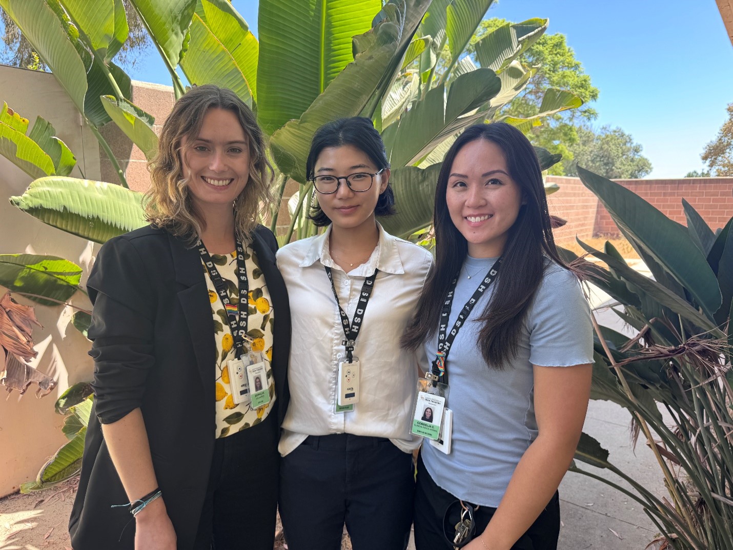 A picture of three interns (names below)